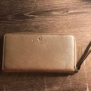 Kate Spade gold wrist wallet